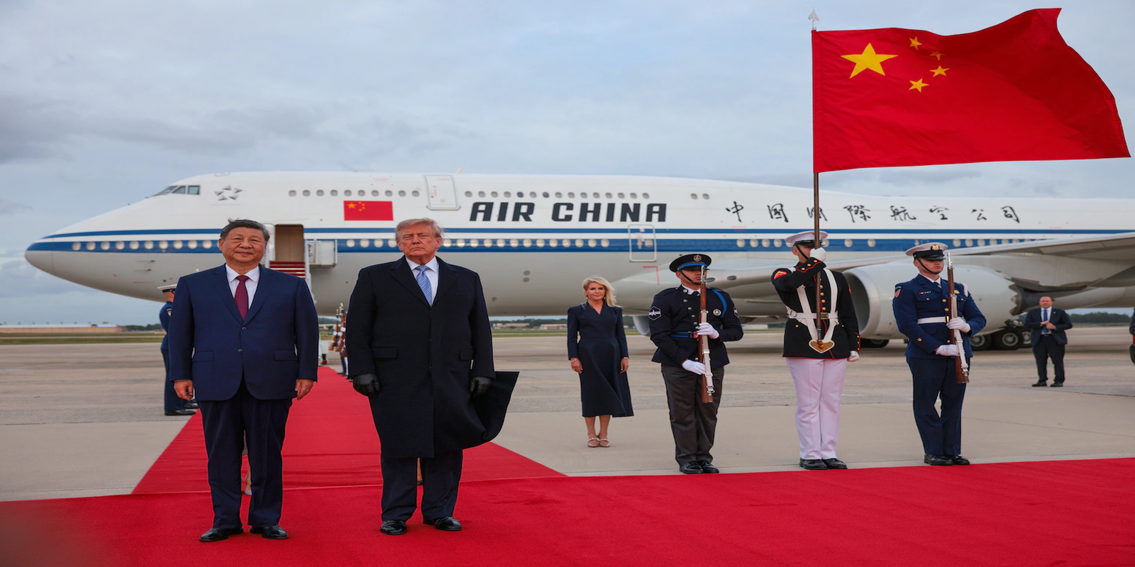 Trump gives Xi Jinping rare airport welcome as summit visit begins